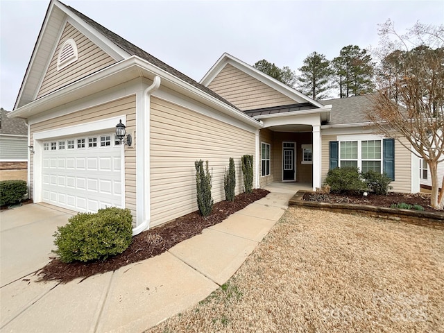 view of front of home with a garage