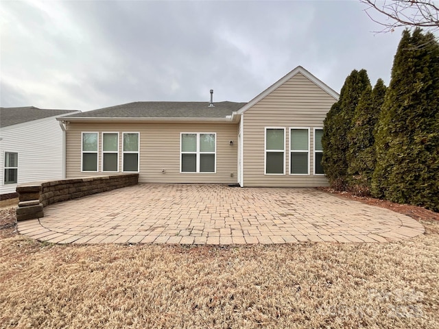 rear view of property with a patio