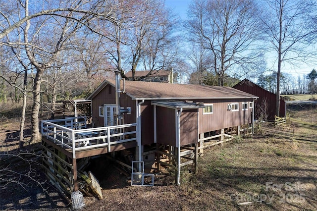 view of home's exterior featuring roof with shingles