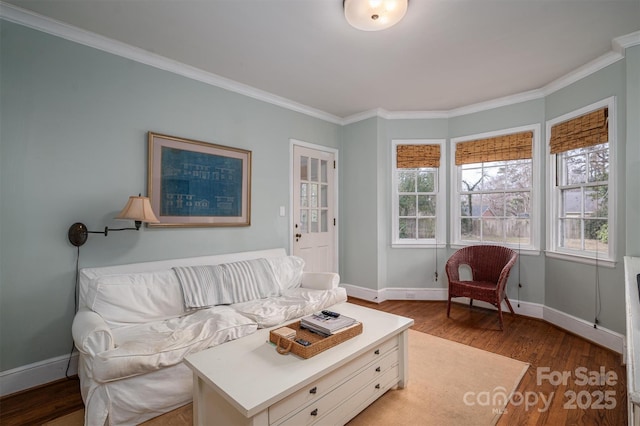 living room with hardwood / wood-style flooring and ornamental molding