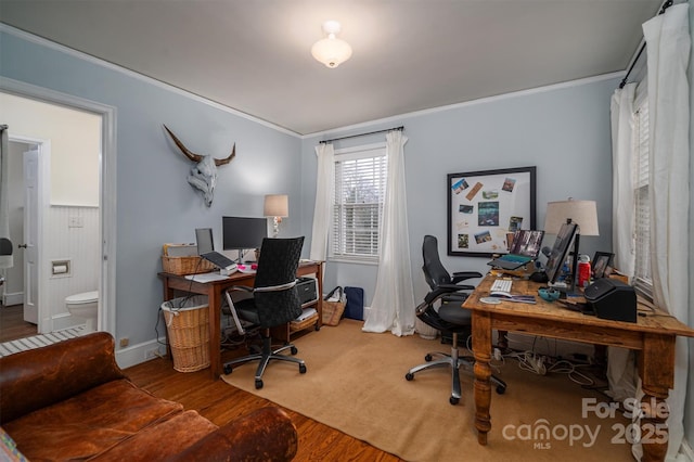 office with hardwood / wood-style floors and ornamental molding