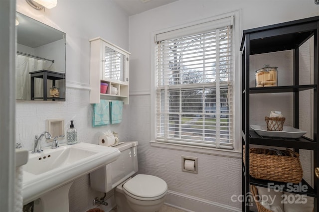 bathroom with sink and toilet