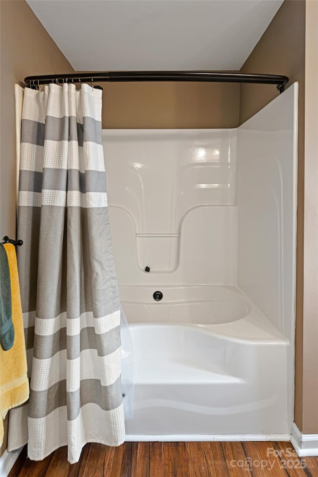 bathroom featuring wood finished floors