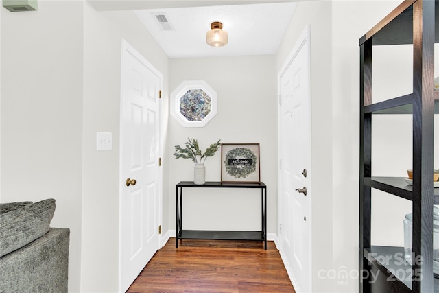 interior space with dark hardwood / wood-style floors