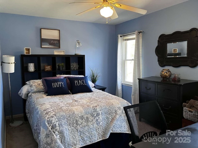 bedroom featuring ceiling fan and carpet flooring