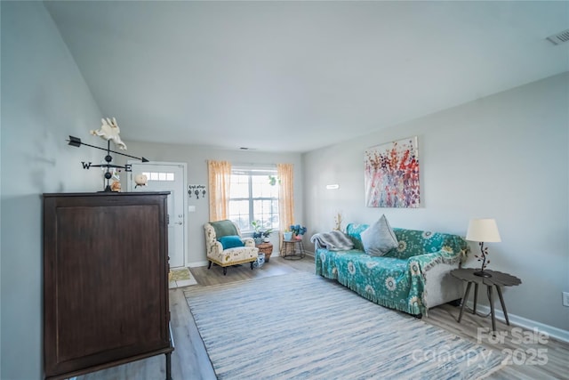 11907 Maria Ester Ct, Charlotte, NC 28277 - living room with baseboards, visible vents, and wood finished floors