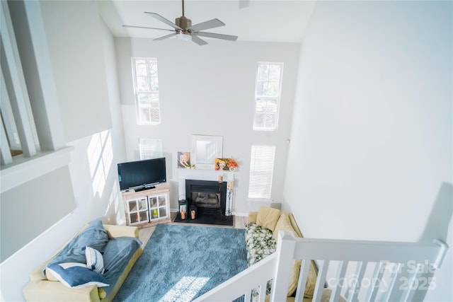 11907 Maria Ester Ct, Charlotte, NC 28277 - bedroom featuring a fireplace with flush hearth, wood finished floors, and ceiling fan