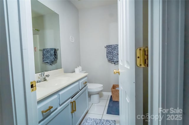 11907 Maria Ester Ct, Charlotte, NC 28277 - bathroom with baseboards, toilet, tile patterned flooring, and vanity