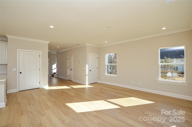unfurnished living room featuring light wood-style flooring, baseboards, and recessed lighting