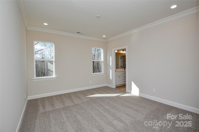 unfurnished bedroom with light carpet, baseboards, visible vents, and crown molding