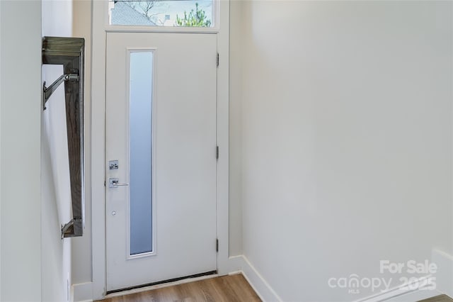 doorway featuring light hardwood / wood-style flooring