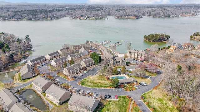 bird's eye view featuring a residential view and a water view