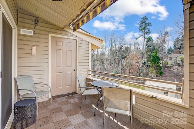 balcony featuring visible vents