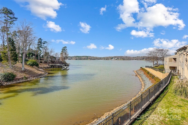 property view of water with fence