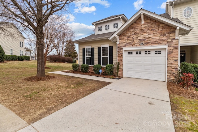 front facade featuring a garage and a front yard