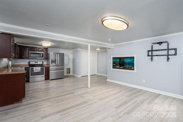 kitchen with sink, light hardwood / wood-style flooring, stainless steel appliances, dark brown cabinetry, and ornamental molding