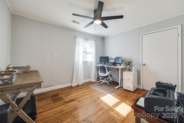 office area with hardwood / wood-style floors, crown molding, and ceiling fan