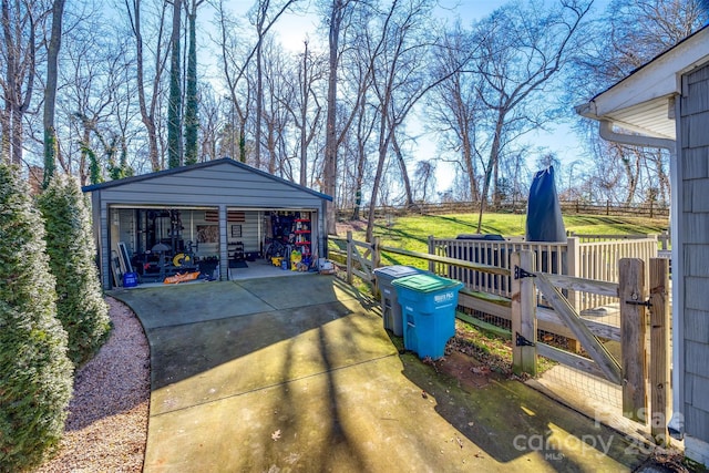 exterior space featuring an outbuilding and a garage