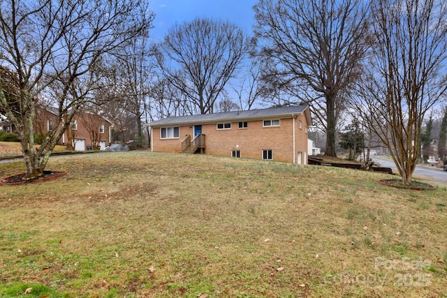 view of front facade with a front lawn