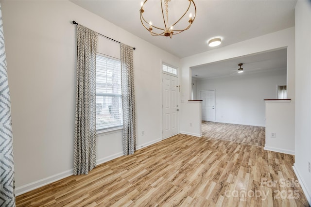 11426 Savannah Creek Dr, Charlotte, NC 28273 - interior space featuring an inviting chandelier, baseboards, and wood finished floors