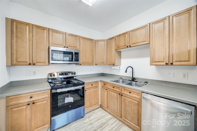11426 Savannah Creek Dr, Charlotte, NC 28273 - kitchen with appliances with stainless steel finishes, a sink, and light brown cabinetry