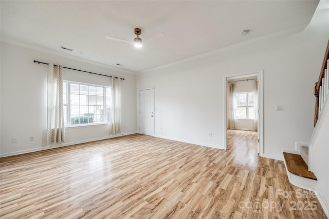 11426 Savannah Creek Dr, Charlotte, NC 28273 - unfurnished living room with light wood-style flooring, stairway, and ornamental molding