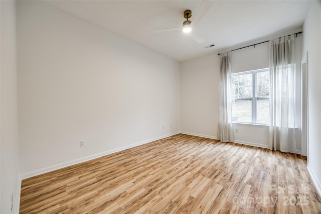 11426 Savannah Creek Dr, Charlotte, NC 28273 - empty room with baseboards, ceiling fan, visible vents, and wood finished floors
