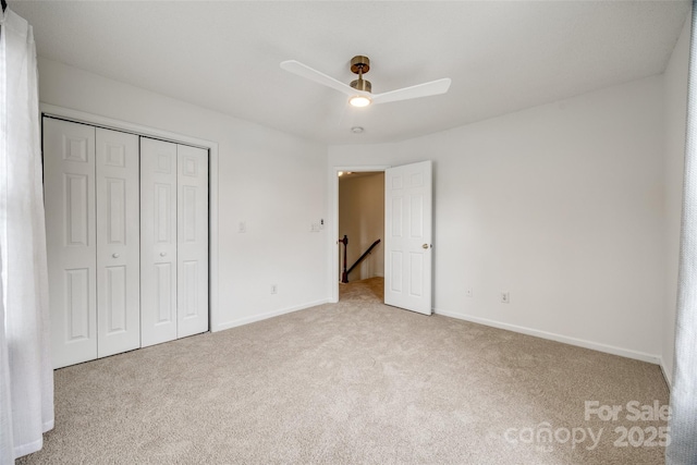 11426 Savannah Creek Dr, Charlotte, NC 28273 - unfurnished bedroom featuring carpet floors, a closet, baseboards, and a ceiling fan
