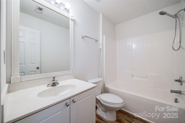 11426 Savannah Creek Dr, Charlotte, NC 28273 - bathroom featuring visible vents, toilet, tub / shower combination, vanity, and wood finished floors