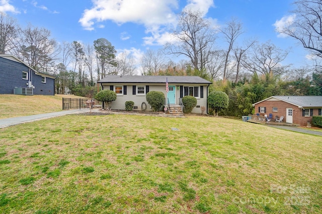 ranch-style house with a front yard