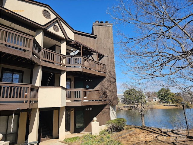 view of property with a water view