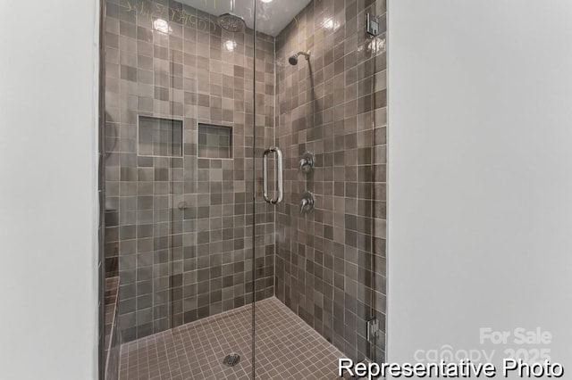 bathroom with an enclosed shower