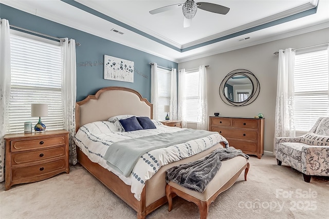 14827 Batteliere Dr, Charlotte, NC 28278 - bedroom featuring light carpet, visible vents, a raised ceiling, and ornamental molding