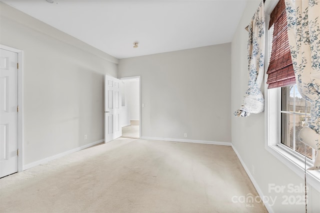 unfurnished bedroom with carpet