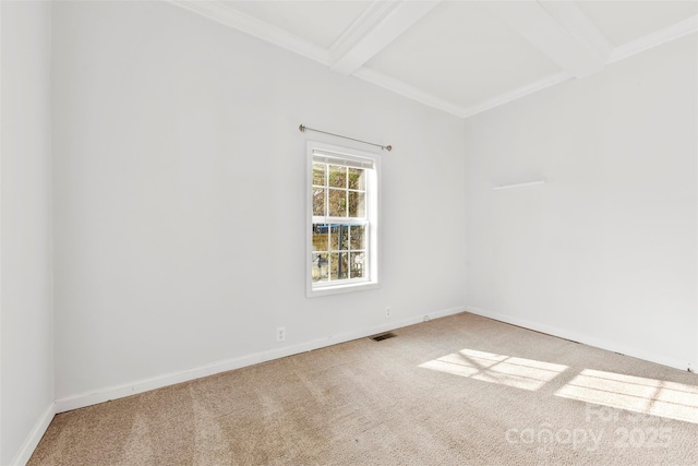 carpeted spare room with beamed ceiling and crown molding