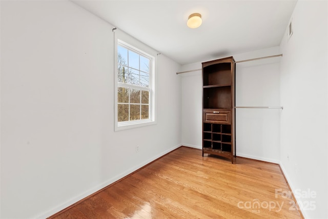 unfurnished bedroom with light hardwood / wood-style flooring