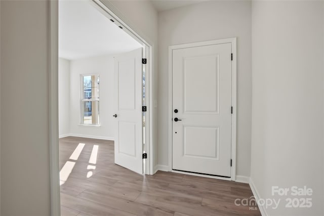 entryway with light wood-type flooring