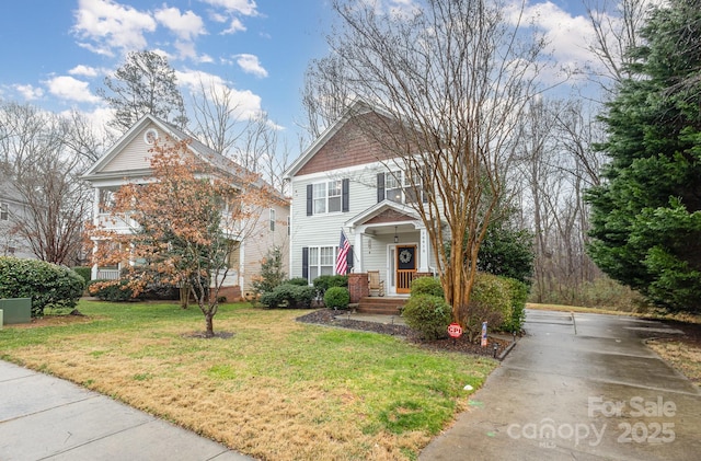 view of front of property with a front lawn