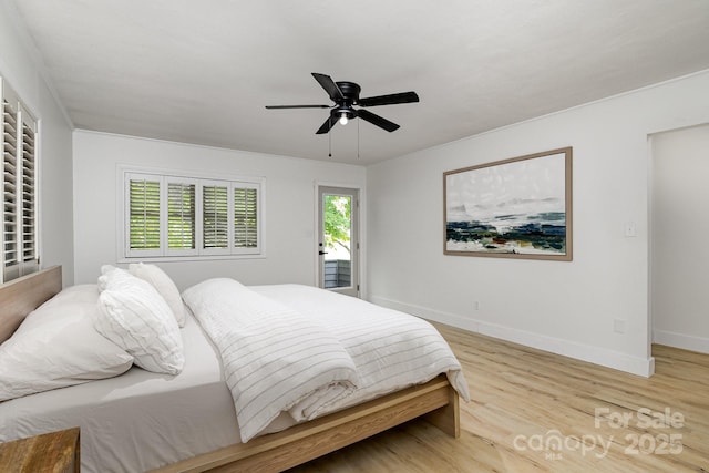 bedroom with light wood finished floors, access to exterior, baseboards, and ceiling fan