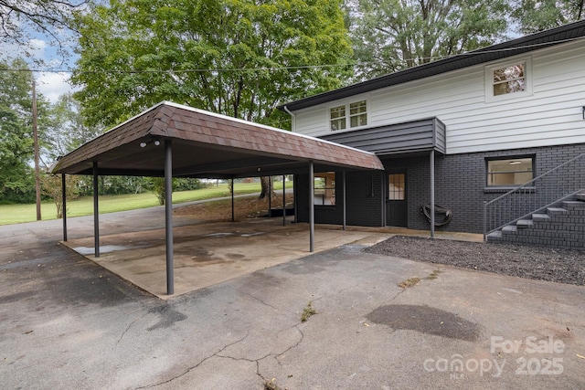 view of parking featuring driveway