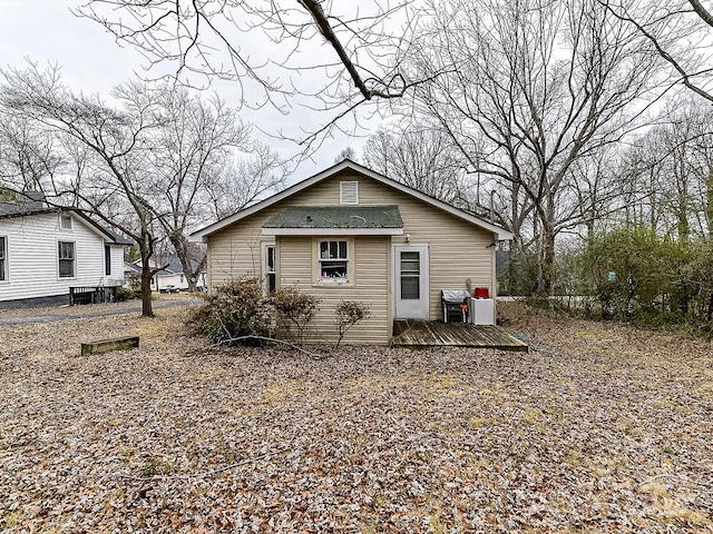 rear view of property with a deck