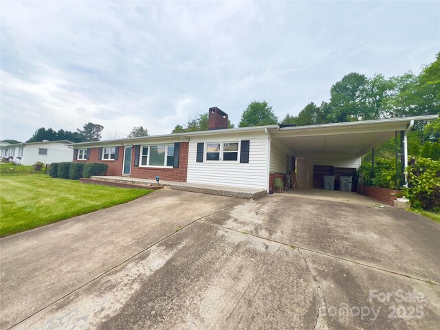 108 Meadowview Pl, Lenoir, NC 28645 - ranch-style house featuring a chimney, driveway, a front lawn, brick siding, and an attached carport