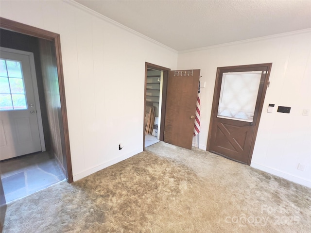 108 Meadowview Pl, Lenoir, NC 28645 - entrance foyer with carpet floors, ornamental molding, and baseboards