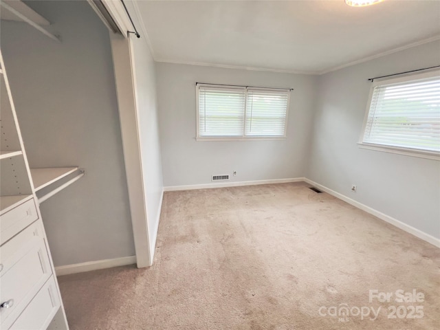 108 Meadowview Pl, Lenoir, NC 28645 - unfurnished bedroom with crown molding, carpet, and baseboards