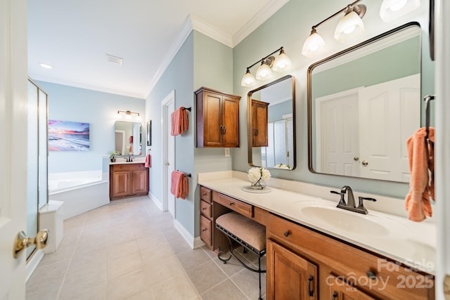 bathroom with a garden tub, crown molding, vanity, baseboards, and tile patterned floors