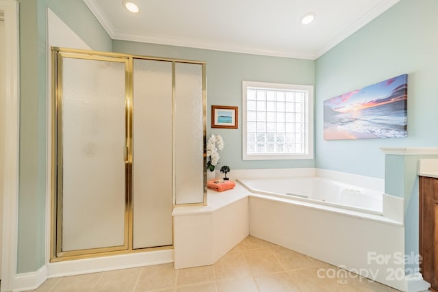 bathroom featuring a stall shower, ornamental molding, a bath, and vanity