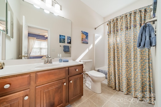 full bath with toilet, shower / bathtub combination with curtain, vanity, and tile patterned floors