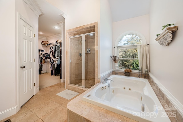 bathroom featuring independent shower and bath, crown molding, and tile patterned floors