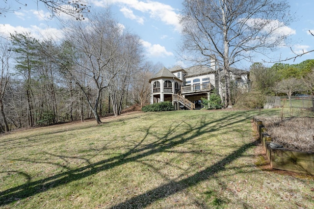 view of yard with a wooden deck