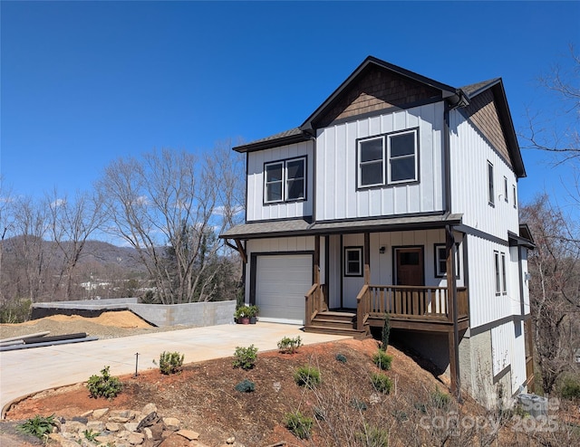 117 Third St, Asheville, NC 28803 - modern farmhouse with covered porch, board and batten siding, concrete driveway, and an attached garage
